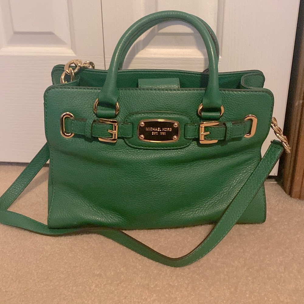 Michael Kors Green Purse with a short and long strap.